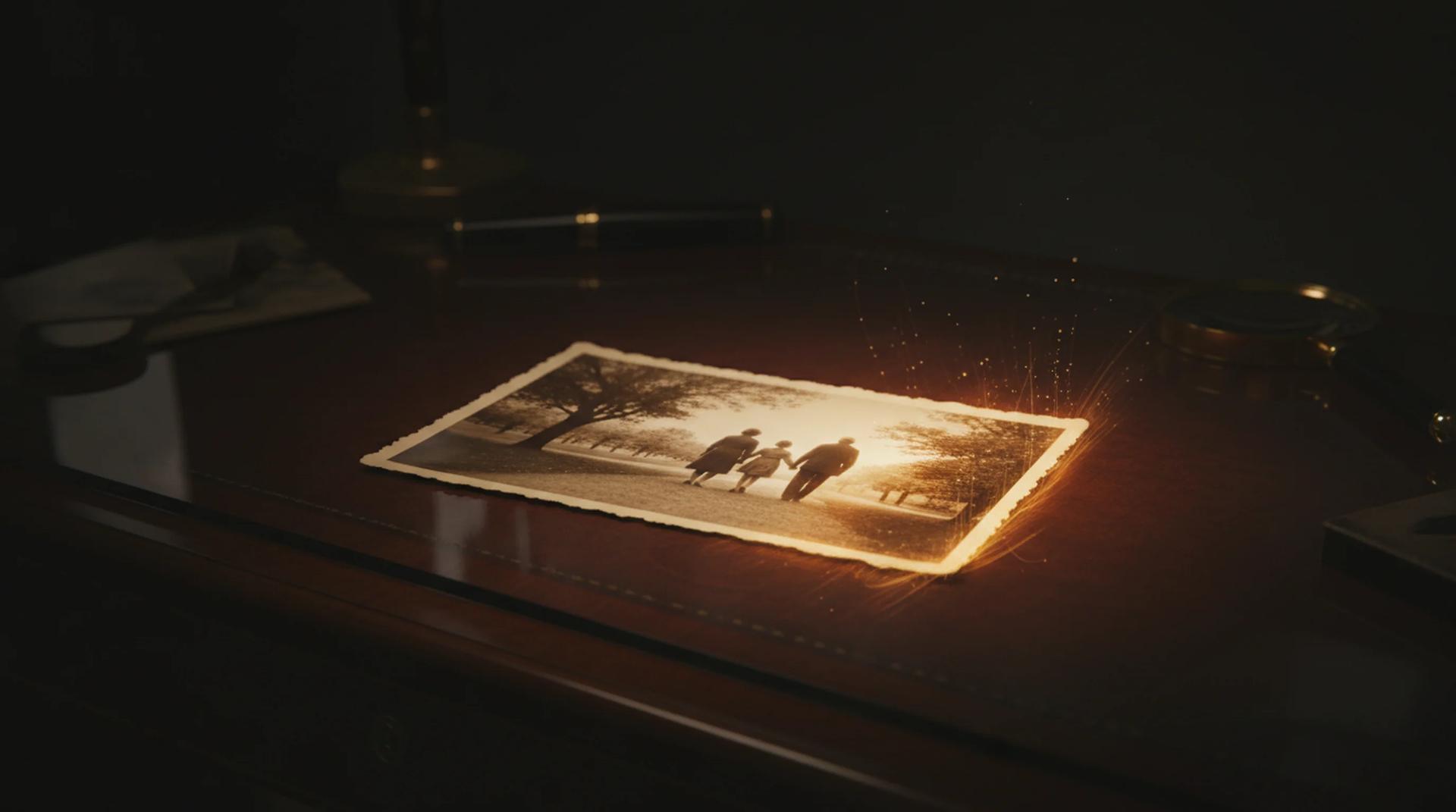 Stylized archival desk with a vintage photo card warming into a living cinematic frame